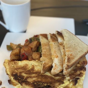 Ronnie's Sandwich Shoppe - Sausage egg and cheese omelette with white toast and potatoes - Sandwiches Near Me - Staten Island, New York Ronnie's Sandwich Shoppe - Sausage egg and cheese omelette with white toast and potatoes - Sandwiches Near Me - Staten Island, New York