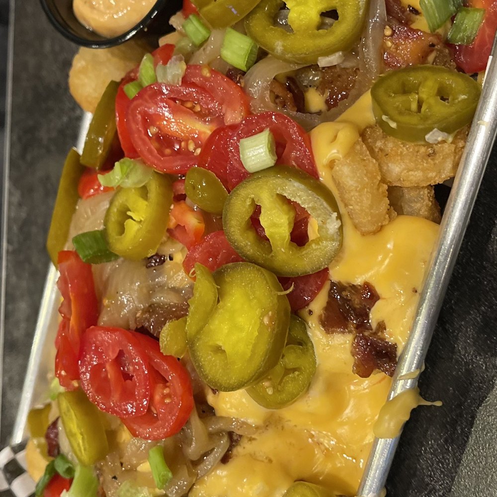 The Famous Restaurant - Famous Tots - Sports Bars Near Me - Centerville, Ohio The Famous Restaurant - Famous Tots - Sports Bars Near Me - Centerville, Ohio