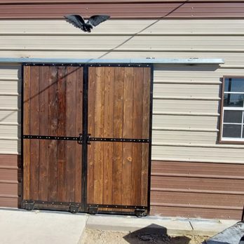 Mayhem Welding - Sliding barndoors for storage shed custom made wood stained panels with clear coating - Fences & Gates Near Me