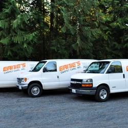 Ernie's Carpet Care - Ernie's Carpet Care fleet of vans with truck mounted steam cleaning equipment.