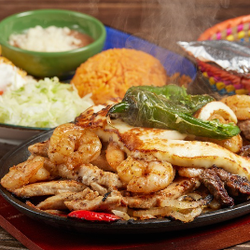 Zacapa Mexican Restaurant & Bar - Zacapa's Fajita (Steak, chicken, shrimp and grilled cheese)
A delicious mix of steak, grilled chicken, and seasoned shrimp.
