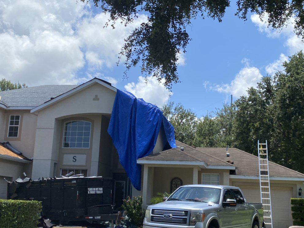 Slide of The Roofing Experts