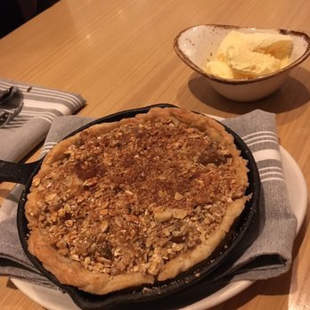 Stoke - Apple Pie with a scoop of vanilla ice cream, served warm. - New American Near Me - Charlotte, North Carolina Stoke - Apple Pie with a scoop of vanilla ice cream, served warm. - New American Near Me - Charlotte, North Carolina