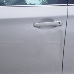 Dents Now Paintless Dent Repair - Another of the dent - you can see it's I. A difficult spot along inner framework