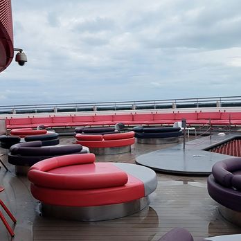 Virgin Voyages - Typical day on the sports deck. Everyone crowds to the tiny pool - Boat Tours Near Me