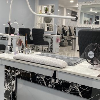 Bliss Nail Bar - Nail tech table and in the distance is the Pedi Spa area - Nail Salons Near Me - Jefferson City, Missouri