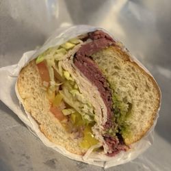 Basil's Deli & Cafe' - TURKEY PASTRAMI PESTO SUB