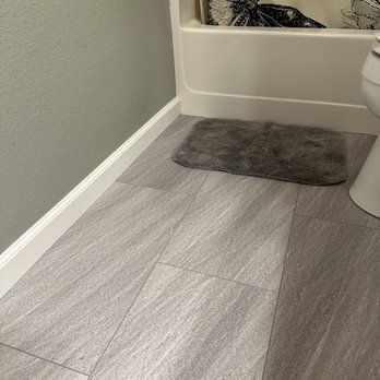 Golden Valley Flooring - New waterproof plank flooring replacing old laminate in bathroom. - Flooring Near Me Golden Valley Flooring - New waterproof plank flooring replacing old laminate in bathroom. - Flooring Near Me