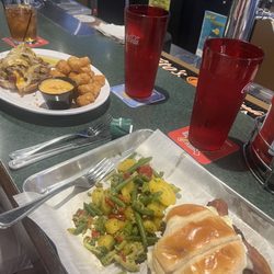 The Woods Golf Club - Jalapeño cream cheese burger with vegetable medley and new prime rib hotdog with tots and beer cheese dip. Flavors 10/10!!