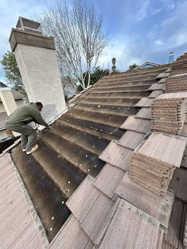 Slide of Manna Roofing Company