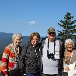 Legacy Tour & Travel - Some travelers at one of the many spectacular views on our Fall Foliage group tour.