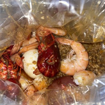 Harbor Seafood Cajun House - shrimp and crab in a plastic bag - Seafood Near Me - Tempe, Arizona