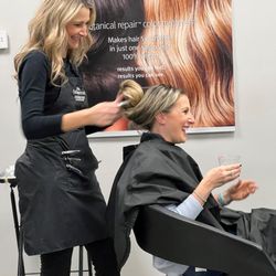 Salon Elan - Our wonderful stylist Tiffani sharing a laugh with a client