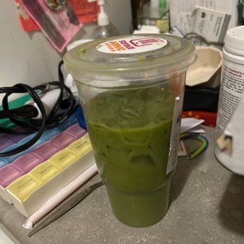 Dunkin' - a green drink in a plastic cup - Donuts Near Me - Hastings, Nebraska Dunkin' - a green drink in a plastic cup - Donuts Near Me - Hastings, Nebraska