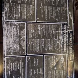 Sweet Caroline’s Kitchen & Cocktails - Bleached out menus that are barely readable.