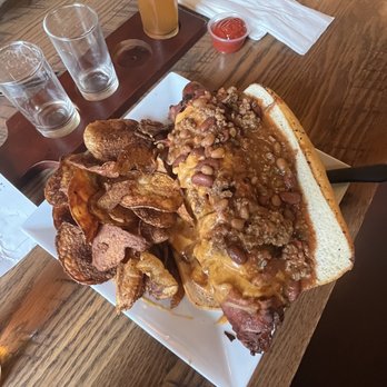 Ryan's Creek House - Creek Legend - 1/2 pound dog, wrapped in hamburger, then wrapped in bacon & deep fried. Covered in chili and cheese. - New American Near Me - Ford City, Pennsylvania