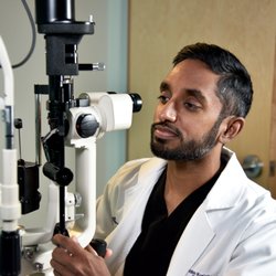 Robin Kuriakose, MD - Dr. Kuriakose using advanced diagnostic tools to evaluate overall eye health.
