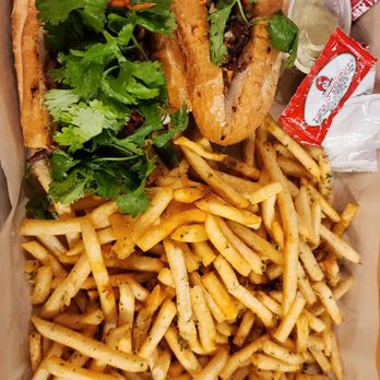 Nguyen's Kitchen - Pork Bahn MI sandwich with garlic fries - Vietnamese Near Me - Orange, California Nguyen's Kitchen - Pork Bahn MI sandwich with garlic fries - Vietnamese Near Me - Orange, California
