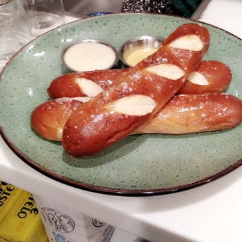 The Broken Cage - Pretzel roll bites served with honey mustard and cheese. - Cocktail Bars Near Me - Denver, Colorado