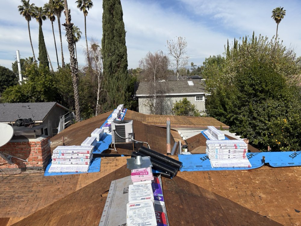 Slide of TopStamp Roofing