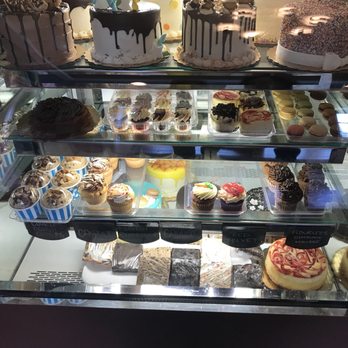 The Caketeria - One of the cases filled with cupcakes and cakes all ready for you to take home! - Bakeries Near Me - Newtown, Pennsylvania The Caketeria - One of the cases filled with cupcakes and cakes all ready for you to take home! - Bakeries Near Me - Newtown, Pennsylvania