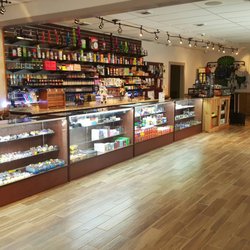The Smoking Glass Lounge - Huge selection of vape