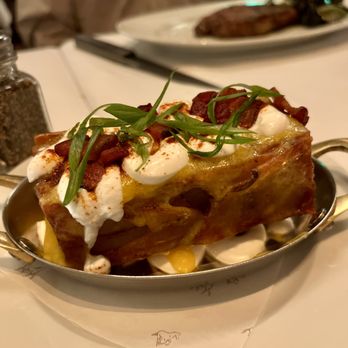 Bricks and Horses - a plate of food on a table - Breakfast & Brunch Near Me - Fort Worth, Texas