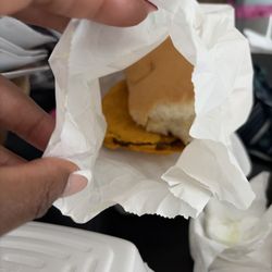 Jerk Center - Spicy beef patty and coco bread