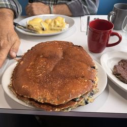 Scrappy's Diner - Size of pancakes. Ham Benedict in the background
