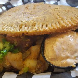 Voodoo Pies - Gumbo meat pie w/ Creole potatoes & peppers.