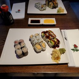 Bottom plate left to right: Yellowtail Scallion, spicy baby lobster, Eel avocado  Top plate left to right: salmon avocado, shrimp tempura