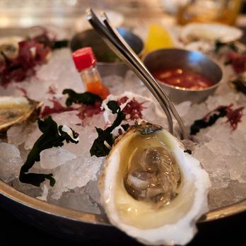 Stripsteak - Half Dozen West Coast (champagne mignonette and incredible horseradish cocktail sauce) - Steakhouses Near Me - Las Vegas, Nevada Stripsteak - Half Dozen West Coast (champagne mignonette and incredible horseradish cocktail sauce) - Steakhouses Near Me - Las Vegas, Nevada