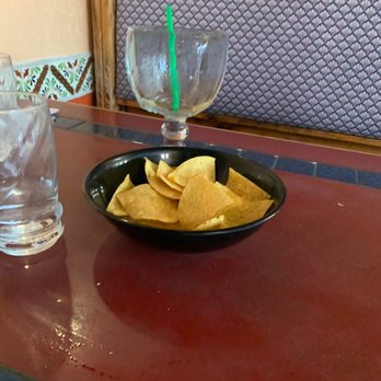 El Tapitio - a bowl of chips and a glass of water - Mexican Near Me - Vernonia, Oregon El Tapitio - a bowl of chips and a glass of water - Mexican Near Me - Vernonia, Oregon