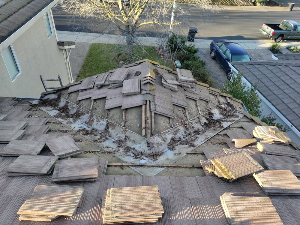 Slide of Quinn Bro's Roofing