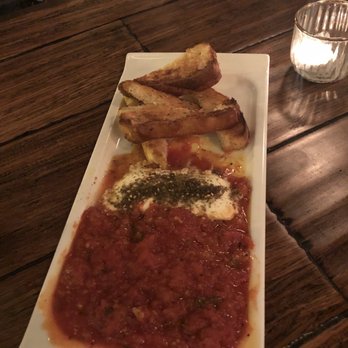 Bar Solita - Spicy feta tapas- not enough pieces of focaccia to dip with - Wine Bars Near Me - Richmond, Virginia Bar Solita - Spicy feta tapas- not enough pieces of focaccia to dip with - Wine Bars Near Me - Richmond, Virginia