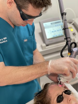 CO2 Laser - CO2 laser skin treatment, also known as laser resurfacing or a laser peel, is a dermatological procedure that uses a carbon dioxide (CO2) laser to rejuvenate and resurface the skin. This treatment is often used to reduce the appearance of wrinkles, scars, sun damage, and other skin irregularities. CO2 Laser - CO2 laser skin treatment, also known as laser resurfacing or a laser peel, is a dermatological procedure that uses a carbon dioxide (CO2) laser to rejuvenate and resurface the skin. This treatment is often used to reduce the appearance of wrinkles, scars, sun damage, and other skin irregularities.