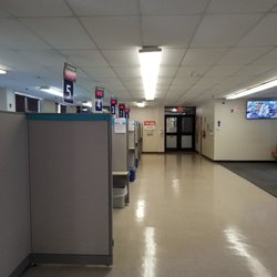 DMV Wakefield, Rhode Island - After check-in, you will receive a number and be assisted at one of these stations.