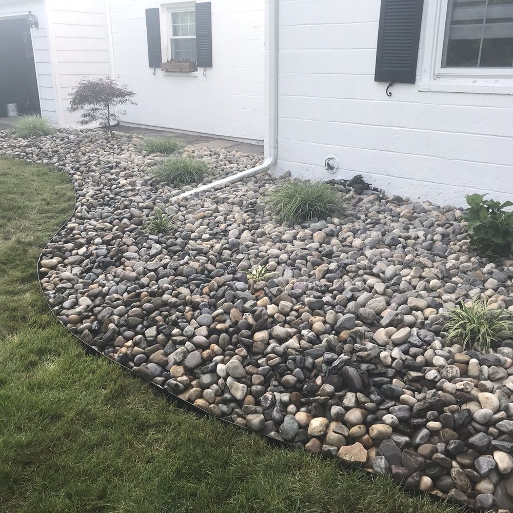 Jason Landscape Contractors - River rocks and grasses - Landscaping Near Me Jason Landscape Contractors - River rocks and grasses - Landscaping Near Me