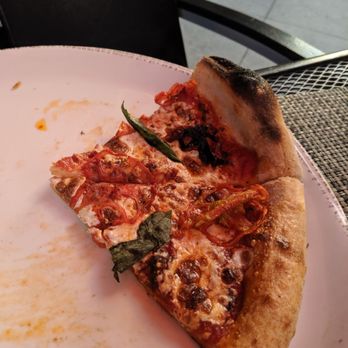 Siena Tavern - Remnants of the Marguerita pizza - Italian Near Me - Chicago, Illinois Siena Tavern - Remnants of the Marguerita pizza - Italian Near Me - Chicago, Illinois