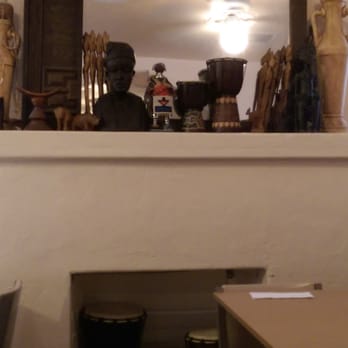 Zemam's - Fireplace in one of the dining spaces. - Ethiopian Near Me - Tucson, Arizona