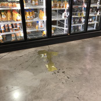 Walmart - Spilled orange juice. Multiple employees within seeing distance and no one bothered to clean it up or call someone to clean it up. - Grocery Near Me - Richmond, Virginia