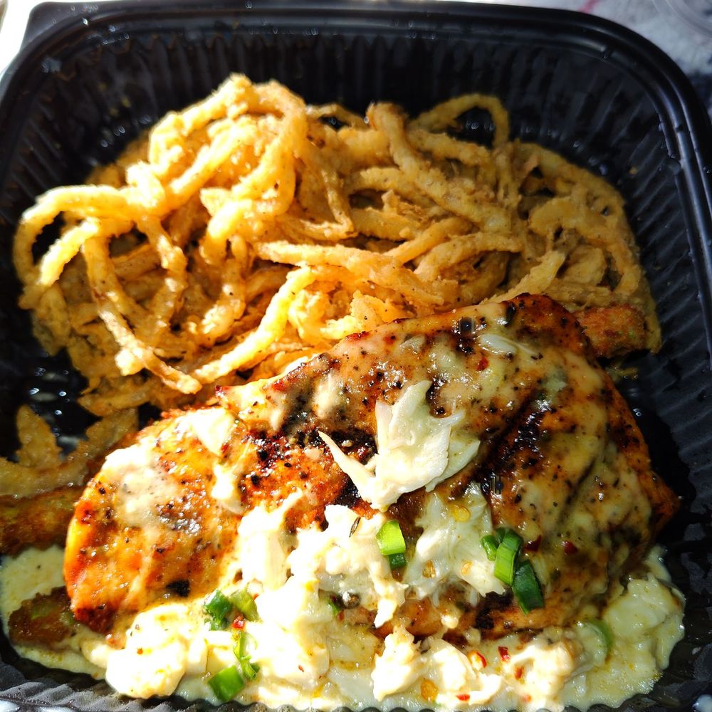 Saltgrass Steak House - Salmon Oscar with onion strings. - Steakhouses Near Me - Bedford, Texas Saltgrass Steak House - Salmon Oscar with onion strings. - Steakhouses Near Me - Bedford, Texas
