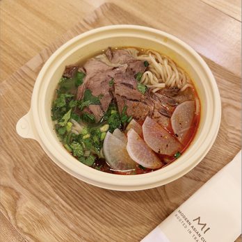 Mi - Our signature Beef Noodle Soup is a classic Chinese dish, featuring hand-pulled noodles in a flavorful, aromatic beef broth. - Chinese Near Me - New York, New York Mi - Our signature Beef Noodle Soup is a classic Chinese dish, featuring hand-pulled noodles in a flavorful, aromatic beef broth. - Chinese Near Me - New York, New York