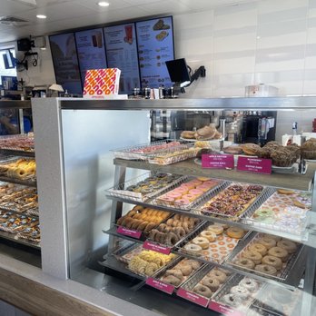 Dunkin' -  a variety of donuts in a display case - Donuts Near Me - Mount Pleasant, South Carolina