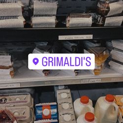 Grimaldi's Bakery - The fridge with all the cakes and cup of cakes.