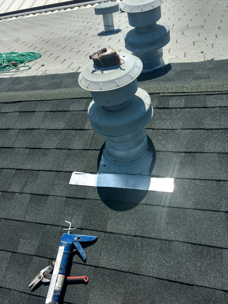 Slide of Magic Hands Roofing