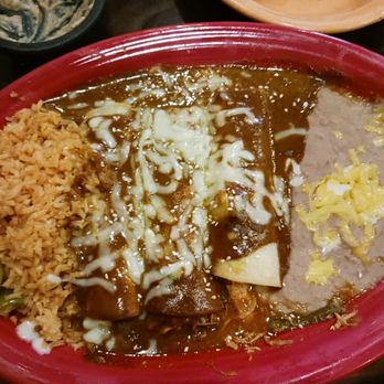 Mi Tierra - Chicken mole enchiladas with beans and rice - Mexican Near Me - Lincoln, Nebraska
