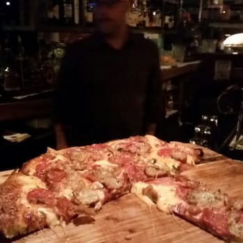 Alibi Room - Open-flame brick-oven pizza. Lots of pig. - New American Near Me - Seattle, Washington Alibi Room - Open-flame brick-oven pizza. Lots of pig. - New American Near Me - Seattle, Washington
