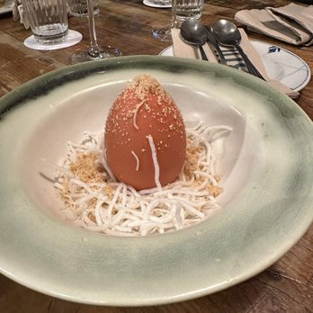 Babula - White chocolate with mango center egg. - Cocktail Bars Near Me - Barcelona, B Babula - White chocolate with mango center egg. - Cocktail Bars Near Me - Barcelona, B