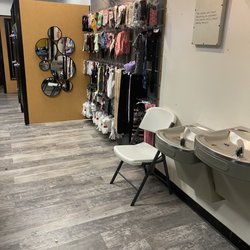 Plato's Closet - Water fountain, dressing area, and accessories